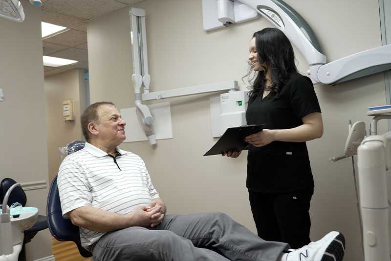 team member consulting with Patient