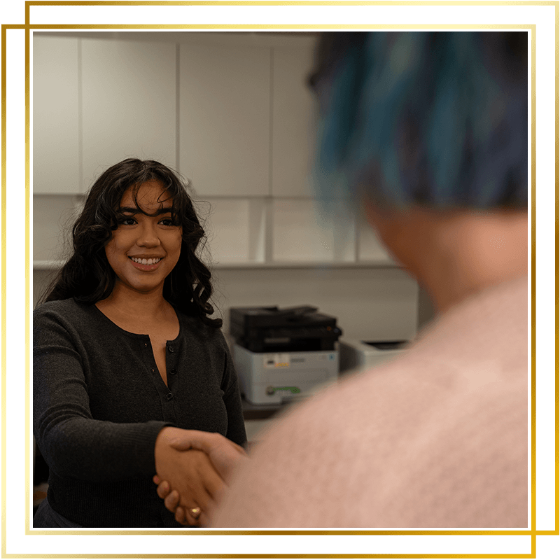 Team member shaking Patient's hand