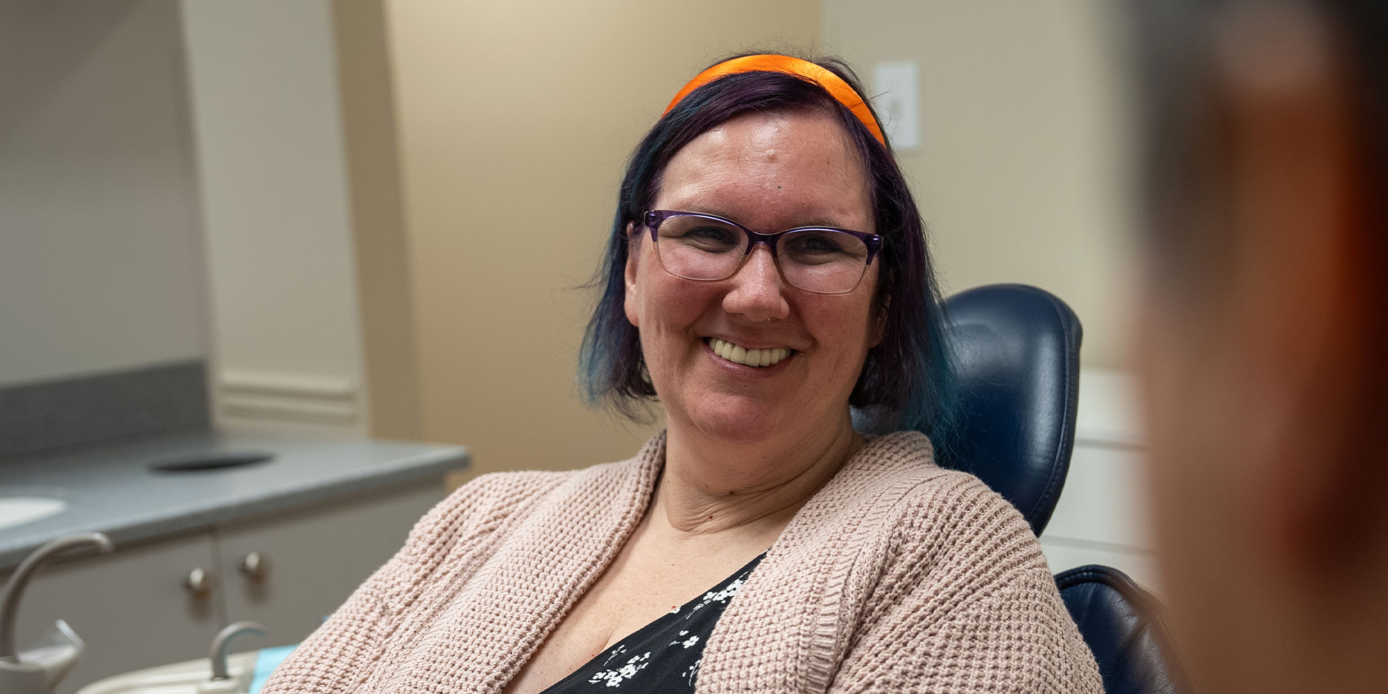 Patient smiling at doctor