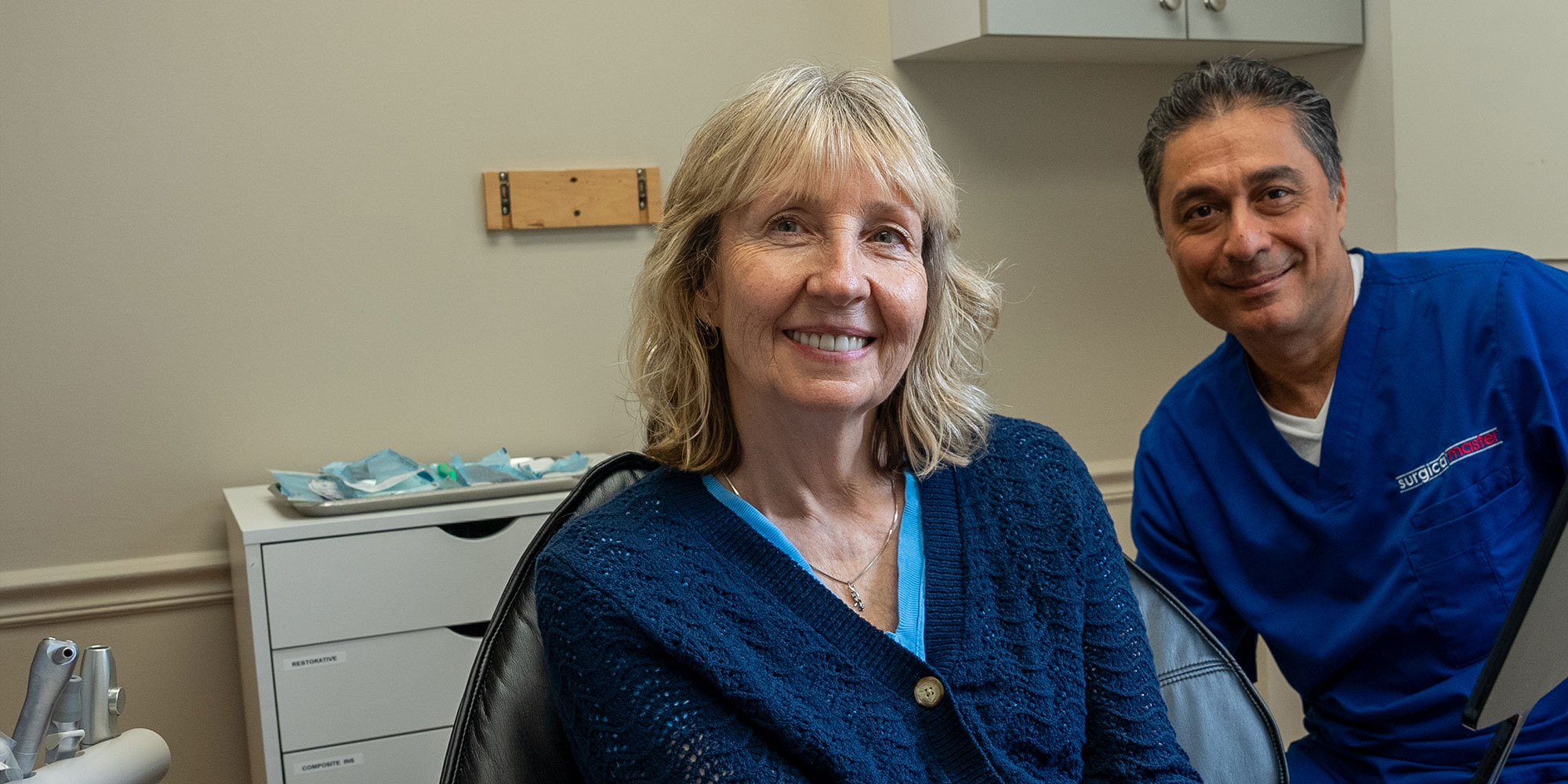 Patient smiling with doctor