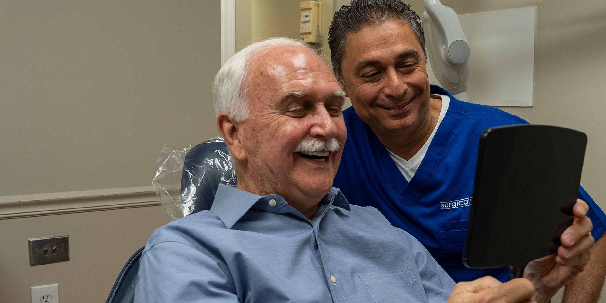 doctor and Patient Looking into mirror together